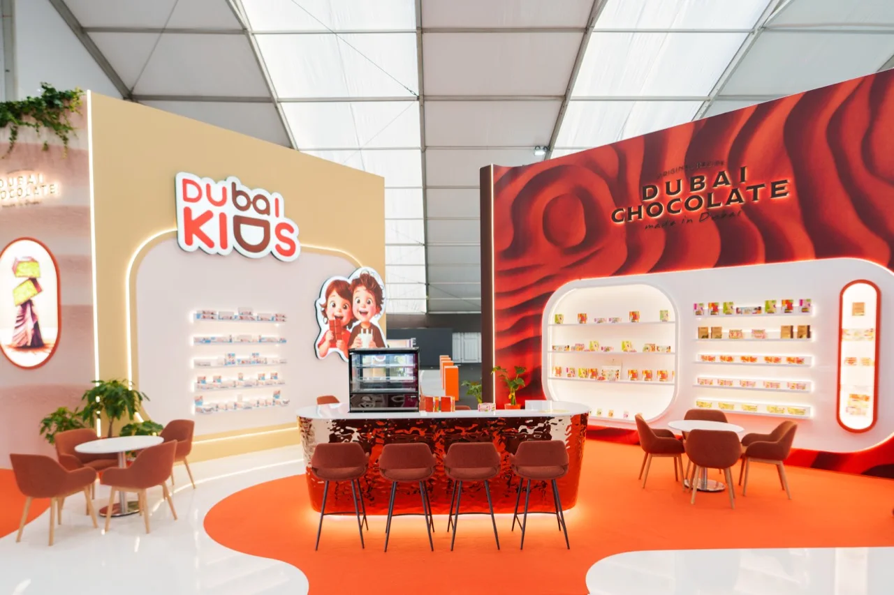 The stand seating area between the Dubai KIDS and Dubai Chocolate displays