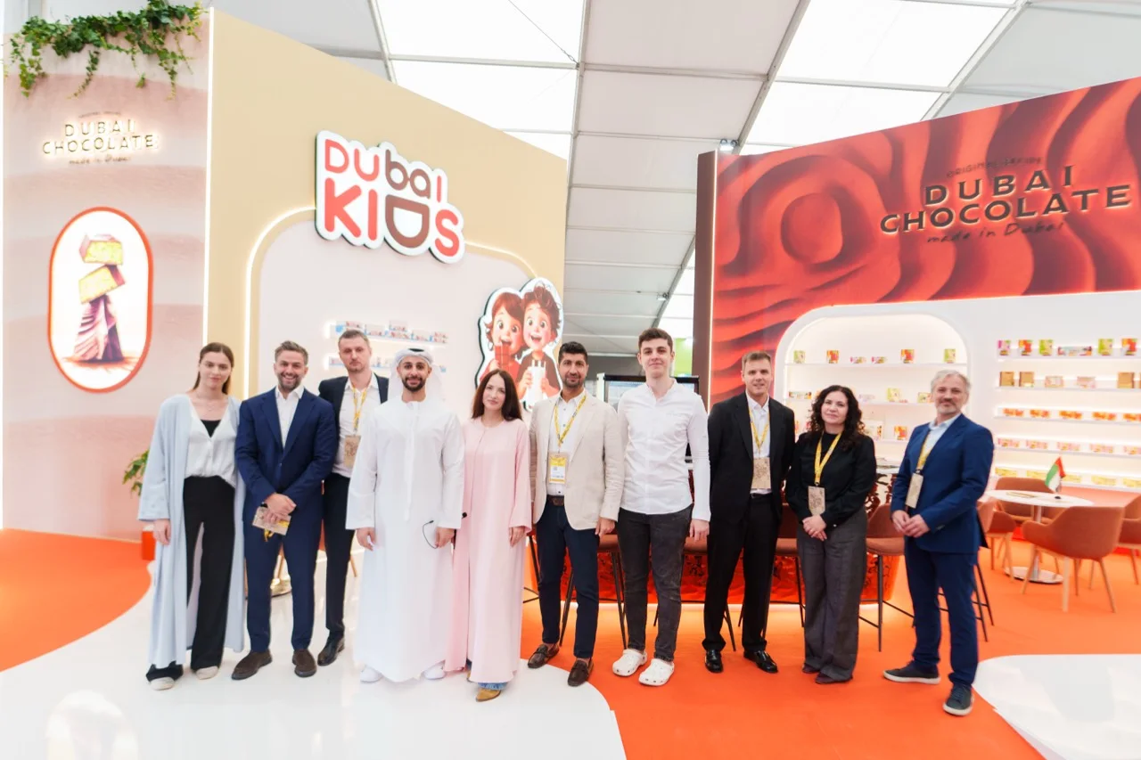 The Katrina team together in front of the Dubai Chocolate and Dubai KIDS displays